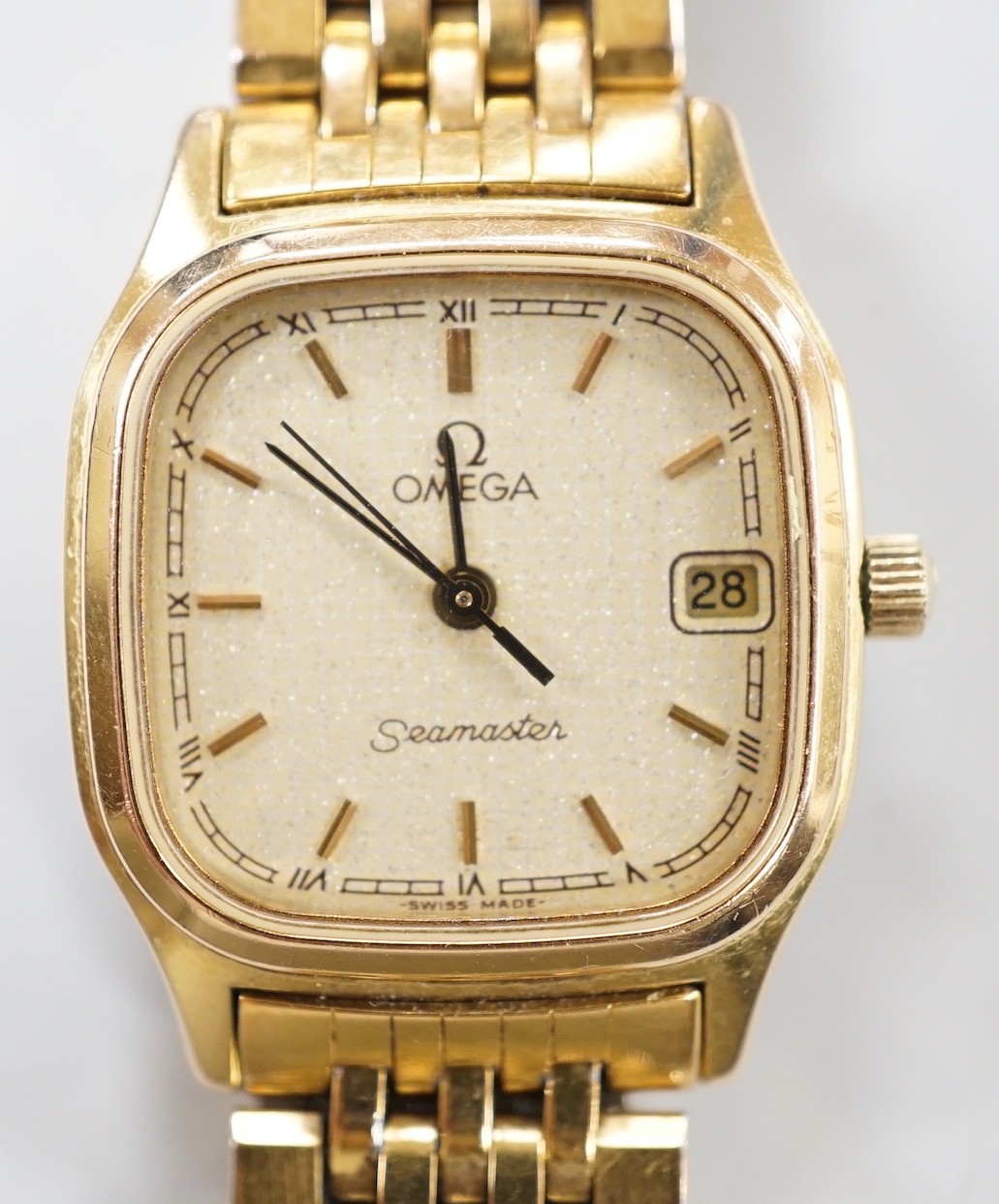 A lady's steel and gold plated Omega Seamaster quartz wrist watch, on an Omega steel and gold plated bracelet.
